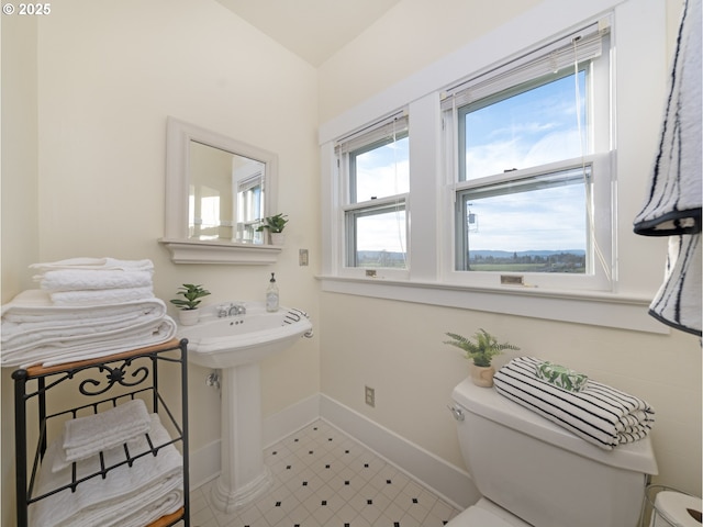 bathroom featuring toilet and sink