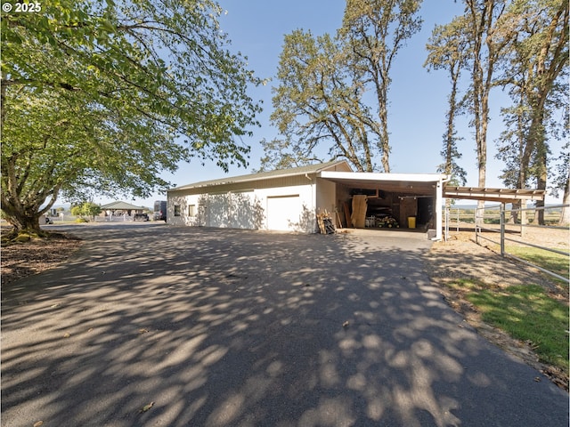 view of front of house with an outdoor structure