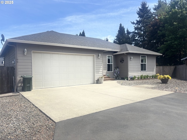 99 Rainbow Way, Kelso, WA 98626 - ranch-style home with driveway, fence, an attached garage, and roof with shingles