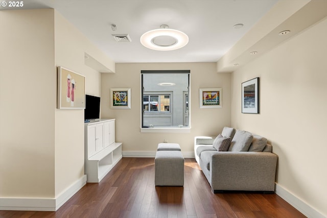 311 NW 12th Ave Unit 602, Portland, OR 97209 - sitting room with dark wood-style flooring and baseboards