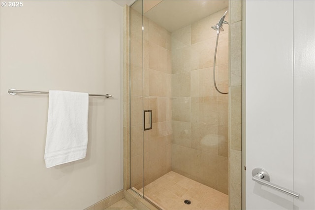 311 NW 12th Ave Unit 602, Portland, OR 97209 - full bath featuring a stall shower and baseboards