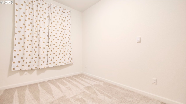 empty room featuring carpet flooring