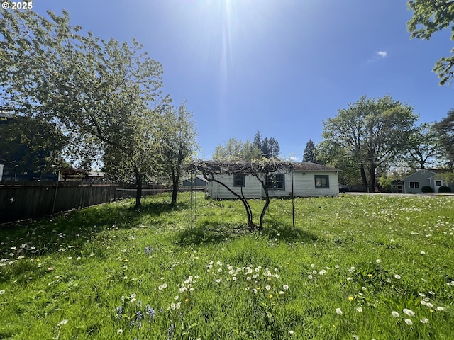 view of yard with fence