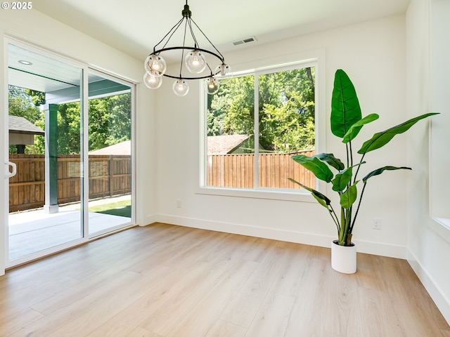 5412 NE 111th St, Vancouver, WA 98686 - unfurnished dining area with a chandelier, plenty of natural light, and light wood finished floors