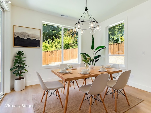 5412 NE 111th St, Vancouver, WA 98686 - dining space featuring plenty of natural light, wood finished floors, and a chandelier