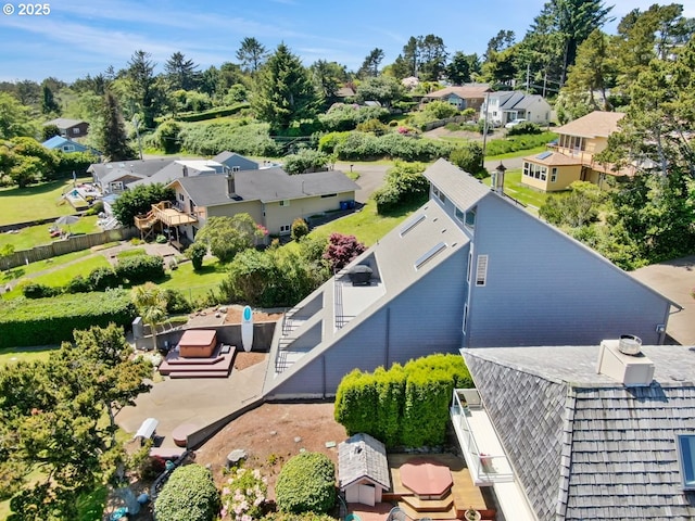 2036 NE Lagoon Ln, Lincoln City, OR 97367 - aerial view of residential area featuring a tree filled landscape