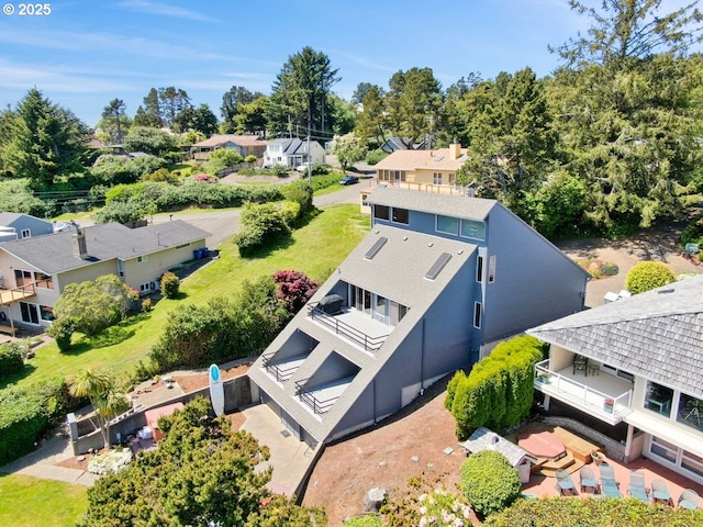 2036 NE Lagoon Ln, Lincoln City, OR 97367 - aerial view of residential area featuring a tree filled landscape