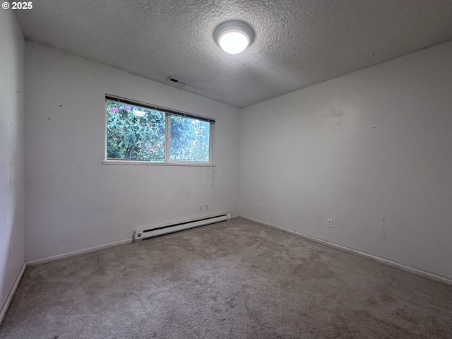 unfurnished room with a textured ceiling, a baseboard heating unit, baseboards, and carpet
