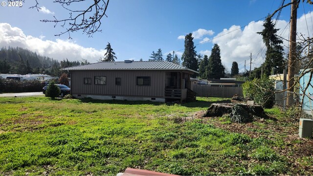 4395 E 20th Ave, Eugene, OR 97403 - back of house with crawl space and metal roof