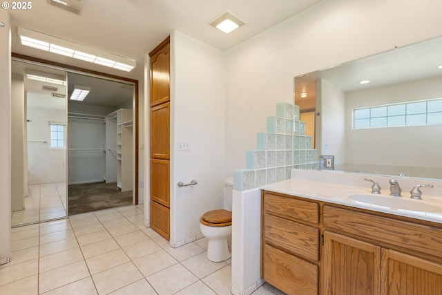 3034 Fisher Rd, Roseburg, OR 97471 - bathroom with toilet, vanity, tile patterned floors, and healthy amount of natural light