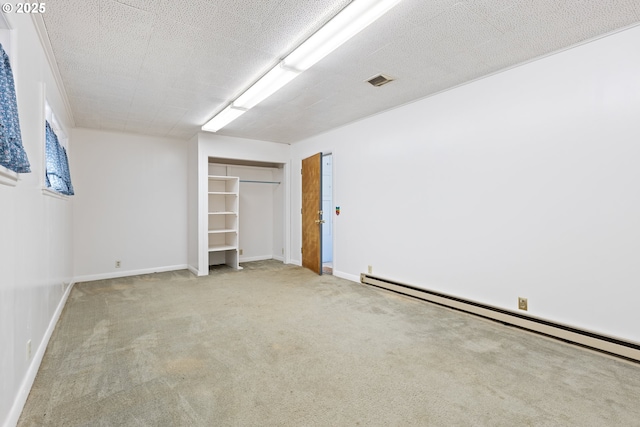 3034 Fisher Rd, Roseburg, OR 97471 - spare room featuring a baseboard radiator, carpet, and baseboards