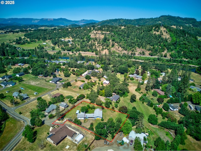 3034 Fisher Rd, Roseburg, OR 97471 - aerial view of property and surrounding area featuring mountains and property boundaries highlighted