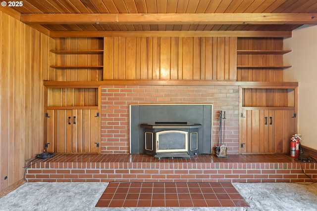 3034 Fisher Rd, Roseburg, OR 97471 - unfurnished living room with wood ceiling with exposed beams, built in shelves, and wooden walls