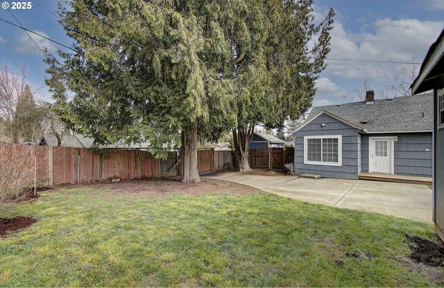 view of yard featuring a fenced backyard and a patio