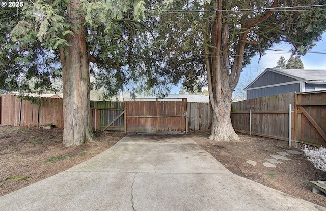 view of yard featuring a gate and fence