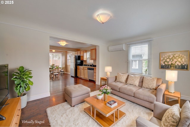 living room featuring dark wood-style floors, baseboards, and a wall mounted AC