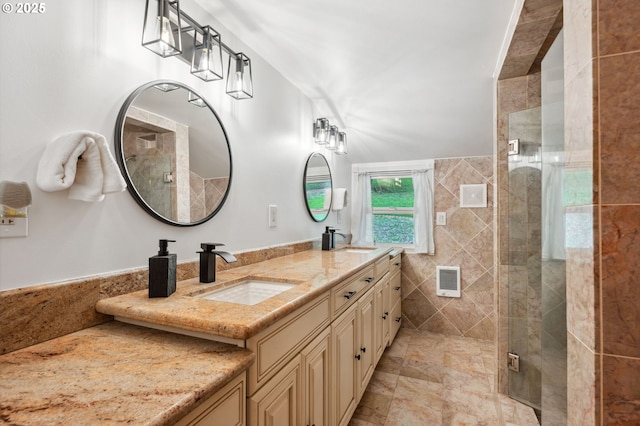 bathroom with vanity and an enclosed shower