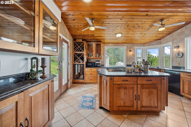 kitchen with dark stone countertops, dishwasher, light tile patterned floors, and wooden ceiling