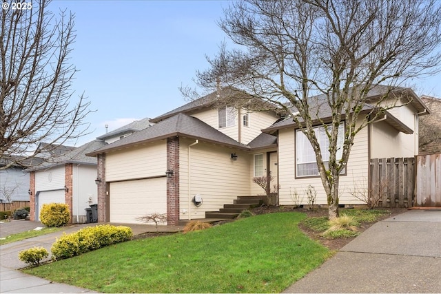 view of front of house with a garage, a front yard, fence, and driveway