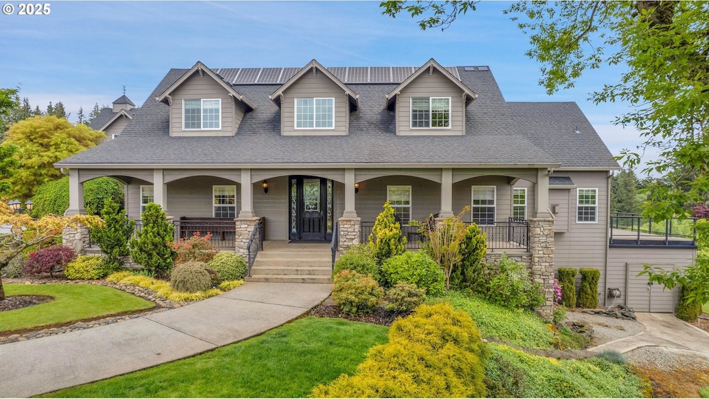 1516 NW 215th Cir, Ridgefield, WA 98642 - craftsman-style home featuring covered porch and a shingled roof