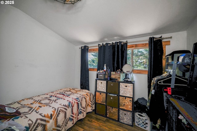 4435 Hazelgreen Rd NE, Salem, OR 97305 - bedroom featuring wood finished floors, multiple windows, and vaulted ceiling