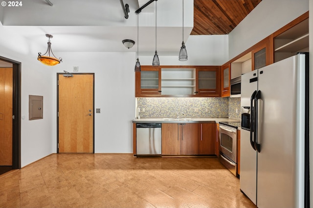 kitchen with stainless steel appliances, electric panel, sink, tasteful backsplash, and pendant lighting