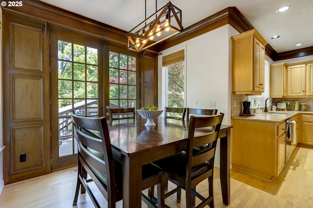 3011 Sabo Ln, West Linn, OR 97068 - dining area with a chandelier, light wood-type flooring, ornamental molding, and recessed lighting