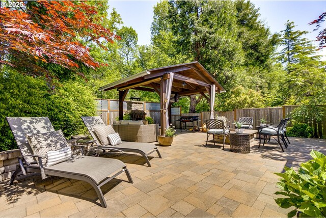 3011 Sabo Ln, West Linn, OR 97068 - fenced backyard with a gazebo, a patio area, and outdoor lounge area