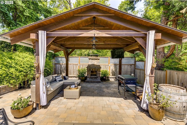3011 Sabo Ln, West Linn, OR 97068 - fenced backyard with a gazebo, a patio, and an outdoor living space with a fireplace