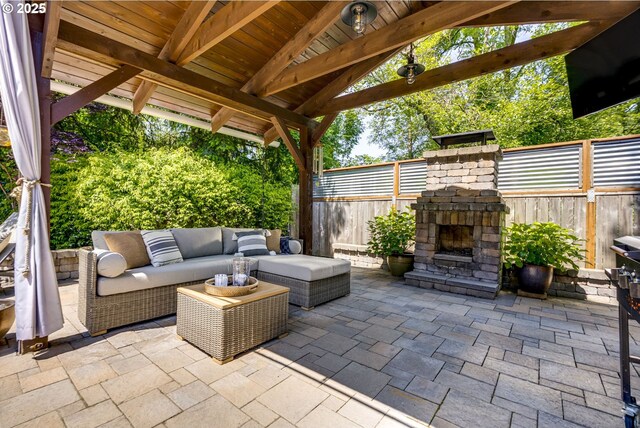 3011 Sabo Ln, West Linn, OR 97068 - view of patio / terrace with an outdoor living space with a fireplace
