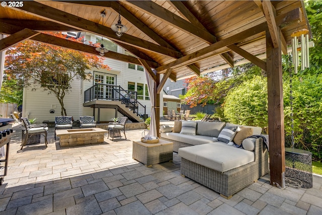 3011 Sabo Ln, West Linn, OR 97068 - view of patio / terrace with stairway, an outdoor living space with a fire pit, and a wooden deck