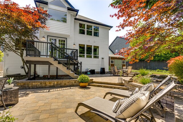 3011 Sabo Ln, West Linn, OR 97068 - rear view of property with stairway, a patio, and a deck