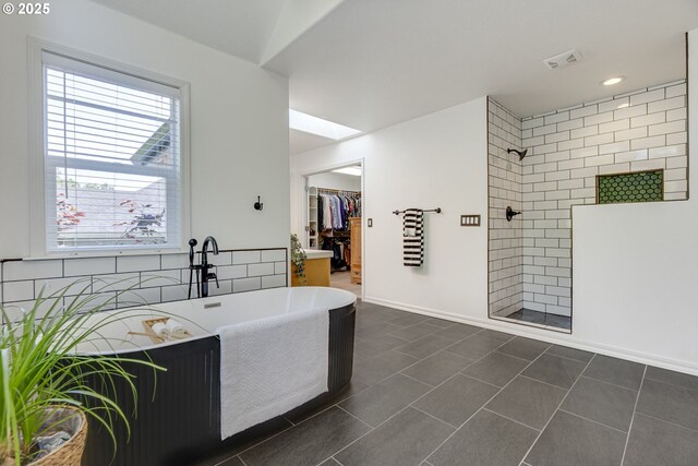 3011 Sabo Ln, West Linn, OR 97068 - full bathroom with a walk in shower, healthy amount of natural light, a walk in closet, and a freestanding tub
