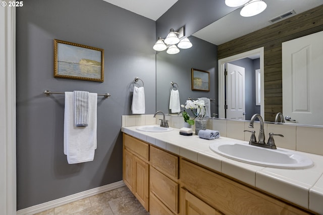 3011 Sabo Ln, West Linn, OR 97068 - full bathroom with double vanity, baseboards, and wood walls