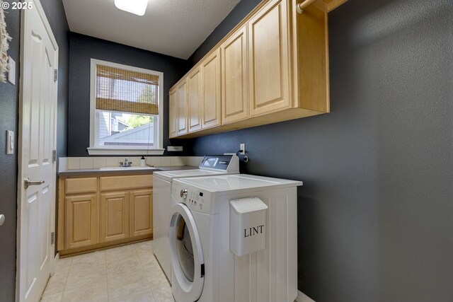 3011 Sabo Ln, West Linn, OR 97068 - washroom featuring cabinet space and washer and dryer
