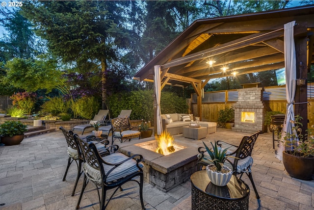 3011 Sabo Ln, West Linn, OR 97068 - view of patio with a gazebo and an outdoor living space with a fireplace