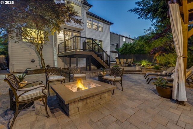 3011 Sabo Ln, West Linn, OR 97068 - view of patio with an outdoor fire pit, stairway, and a deck