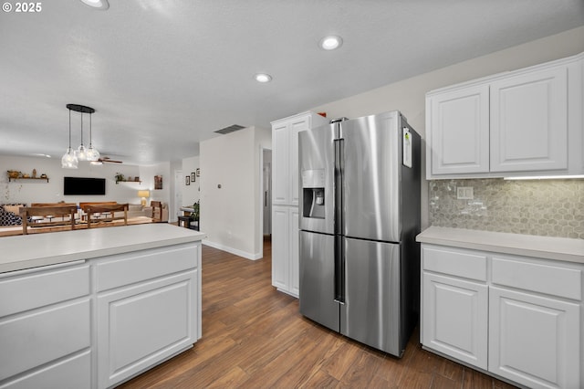 9435 SE 282nd Ave, Boring, OR 97009 - kitchen with stainless steel fridge with ice dispenser, dark wood-type flooring, backsplash, open floor plan, and light countertops