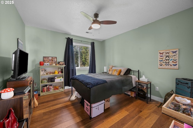 9435 SE 282nd Ave, Boring, OR 97009 - bedroom with wood finished floors, a textured ceiling, and a ceiling fan