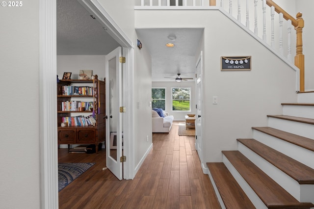 9435 SE 282nd Ave, Boring, OR 97009 - foyer featuring wood finished floors, a ceiling fan, and stairway