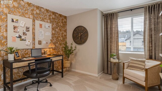 office area featuring wallpapered walls, baseboards, and carpet flooring