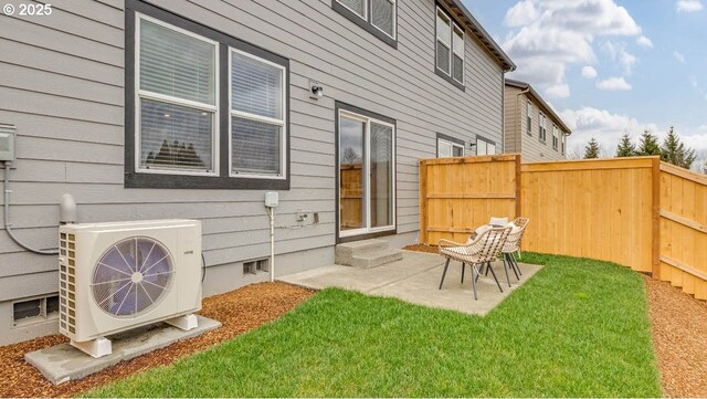 exterior space featuring a yard, ac unit, a patio area, and fence