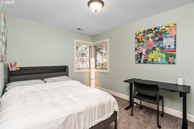 carpeted bedroom featuring visible vents and baseboards