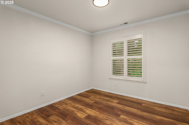 3543 SE Wister St, Milwaukie, OR 97222 - spare room with baseboards, ornamental molding, and dark wood-style flooring