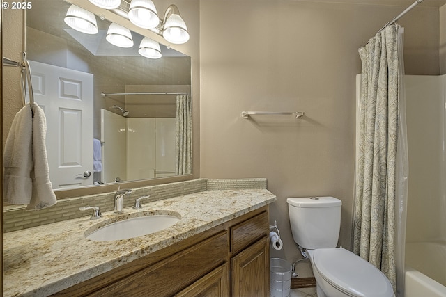 full bath with vanity, toilet, and shower / tub combo with curtain