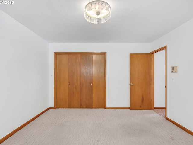 4915 Leif Erikson Dr, Astoria, OR 97103 - unfurnished bedroom with a closet, baseboards, and carpet