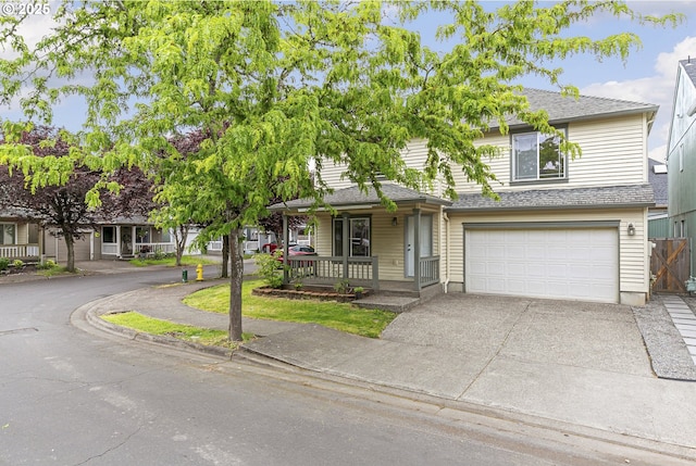 18450 SW Longacre St, Beaverton, OR 97003 - view of front of home featuring a garage, driveway, a porch, and a shingled roof