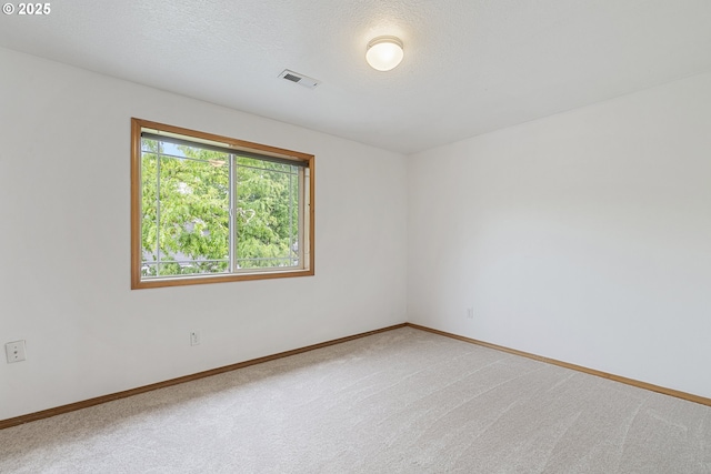 18450 SW Longacre St, Beaverton, OR 97003 - empty room featuring carpet floors and baseboards