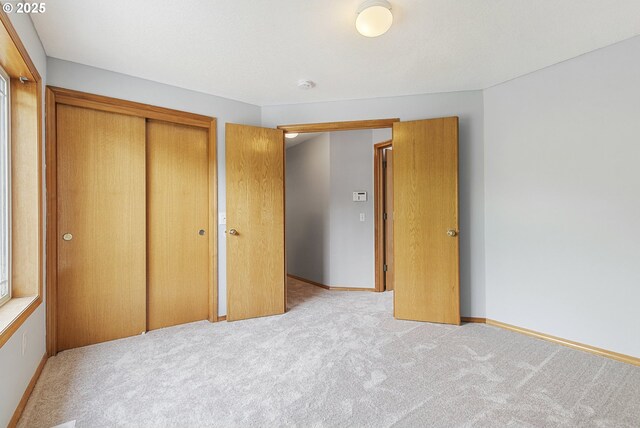 18450 SW Longacre St, Beaverton, OR 97003 - unfurnished bedroom featuring carpet and a closet