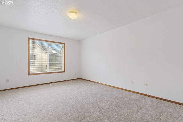 18450 SW Longacre St, Beaverton, OR 97003 - empty room featuring carpet floors and baseboards